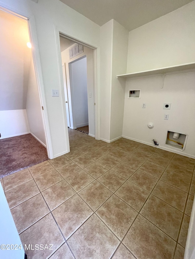 laundry room with washer hookup, electric dryer hookup, light tile patterned flooring, and hookup for a gas dryer