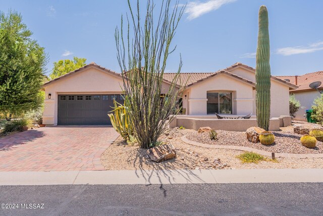 view of front of property with a garage