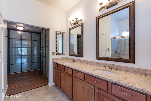 bathroom featuring tile patterned floors and vanity