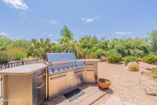 view of patio featuring grilling area and area for grilling