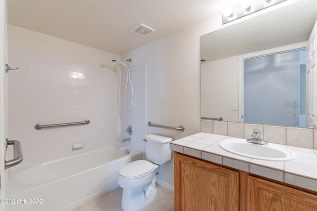 full bathroom featuring shower / tub combination, vanity, and toilet