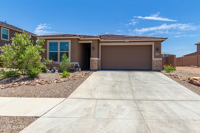 view of front of property with a garage