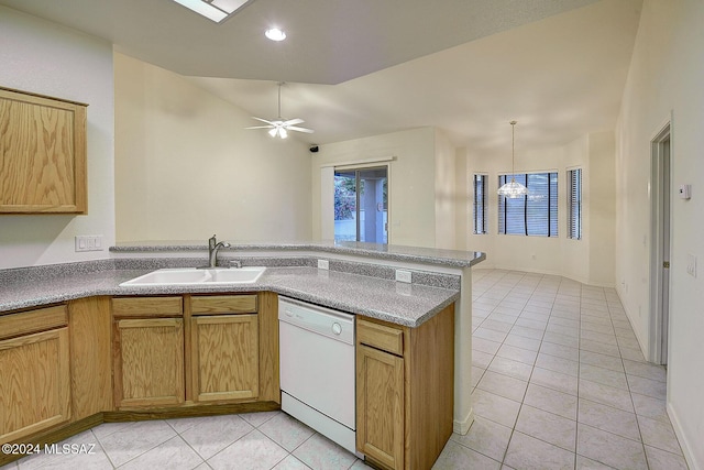 kitchen with white dishwasher, sink, hanging light fixtures, ceiling fan, and light tile patterned floors