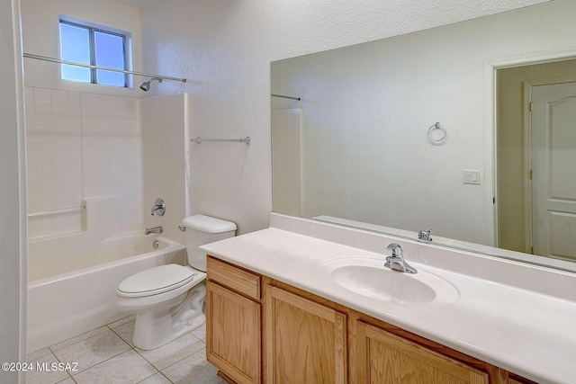 full bathroom featuring tile patterned floors, vanity, toilet, and tub / shower combination