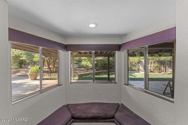 unfurnished sunroom with a healthy amount of sunlight