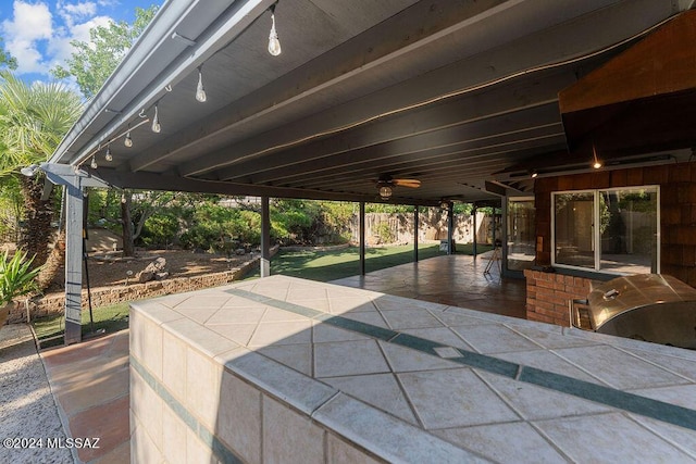 view of patio with a ceiling fan