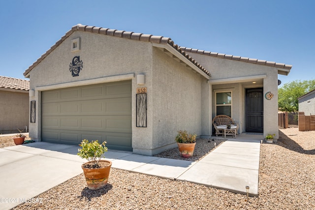 view of front of property featuring a garage