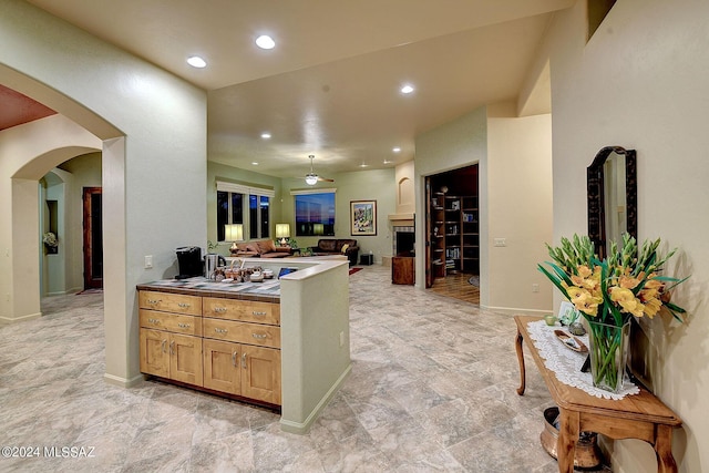 kitchen featuring ceiling fan