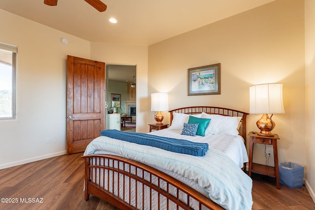 bedroom featuring hardwood / wood-style flooring and ceiling fan