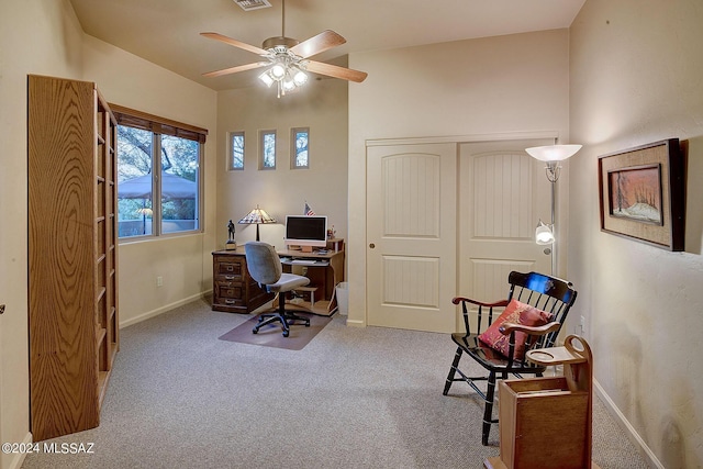 home office with light colored carpet and ceiling fan