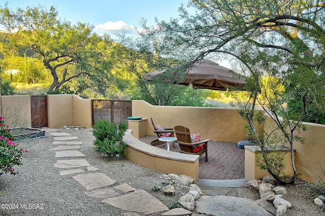 view of patio featuring a fire pit