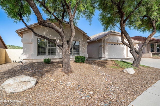 view of front of home featuring a garage