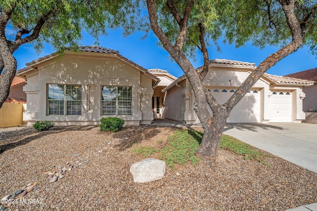 view of front of house with a garage