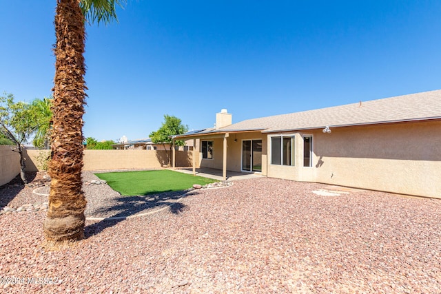 rear view of house with a patio area