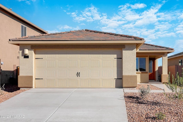 view of front of property with a garage