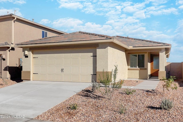 view of front of property featuring a garage