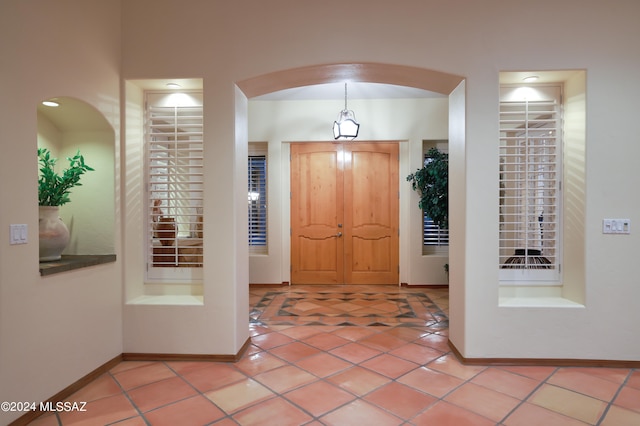 foyer featuring tile patterned floors