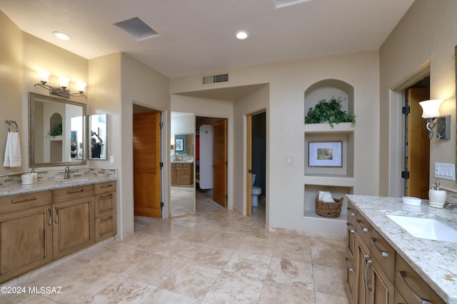 bathroom featuring vanity and tile patterned flooring