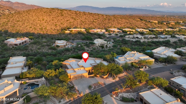 bird's eye view with a mountain view