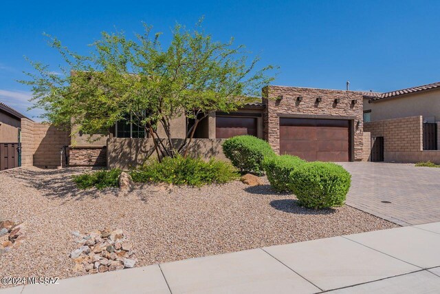 view of front of home with a garage