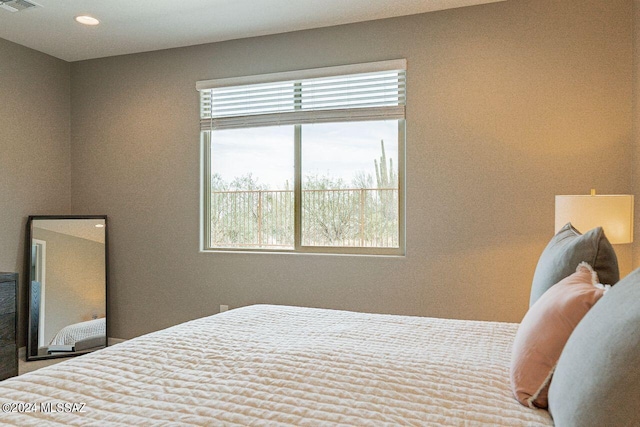 bedroom with visible vents and recessed lighting