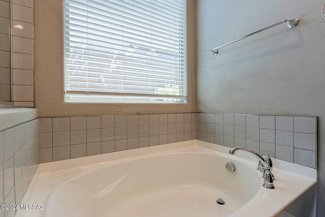 full bathroom featuring a bath
