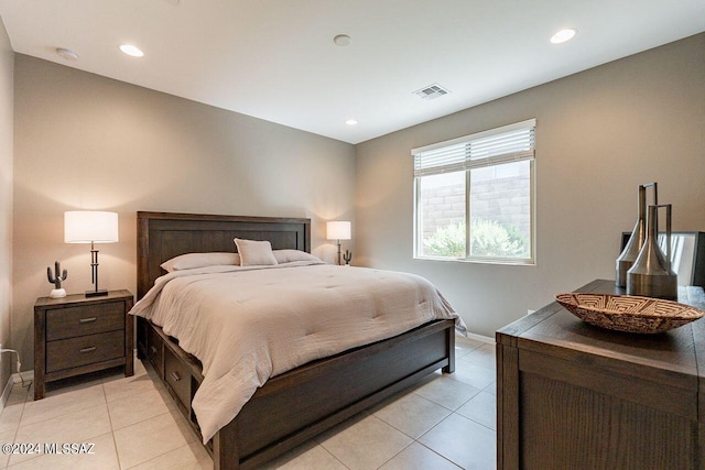 bedroom with light tile patterned floors, baseboards, visible vents, and recessed lighting