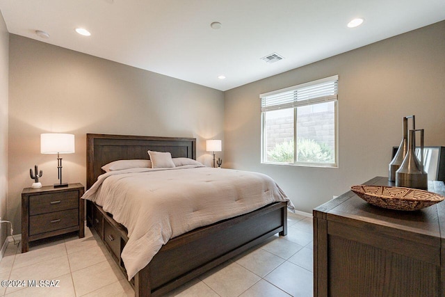 bedroom featuring light tile patterned flooring, baseboards, recessed lighting, and visible vents