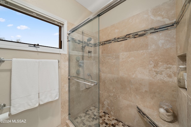 bathroom featuring walk in shower