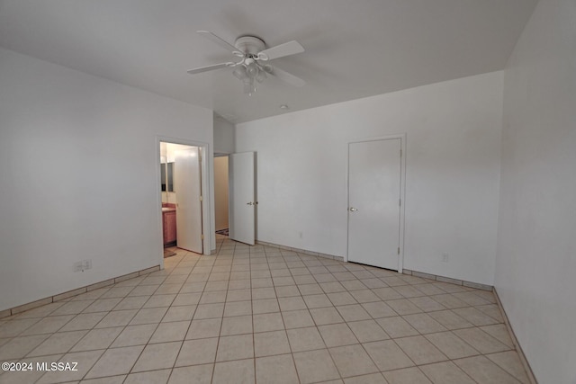 spare room with ceiling fan