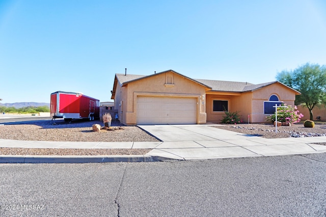 ranch-style house with a garage