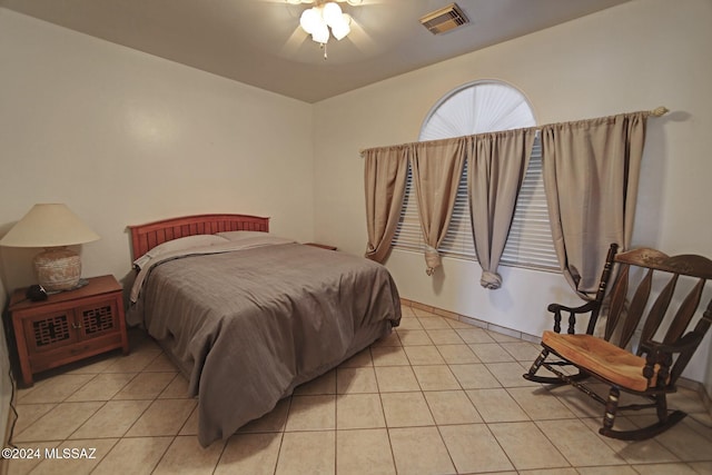 bedroom featuring ceiling fan and light tile patterned floors