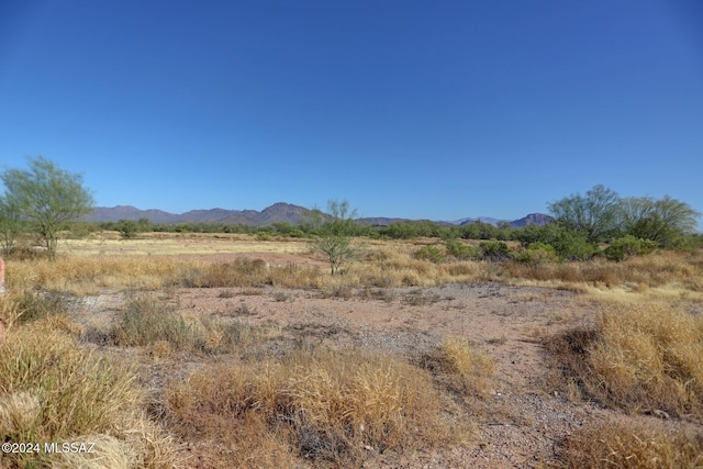 view of mountain feature featuring a rural view