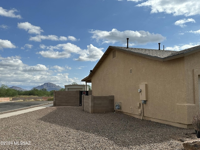 view of home's exterior featuring a mountain view