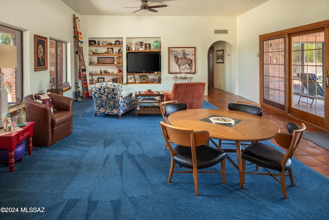 dining room featuring tile patterned floors and ceiling fan