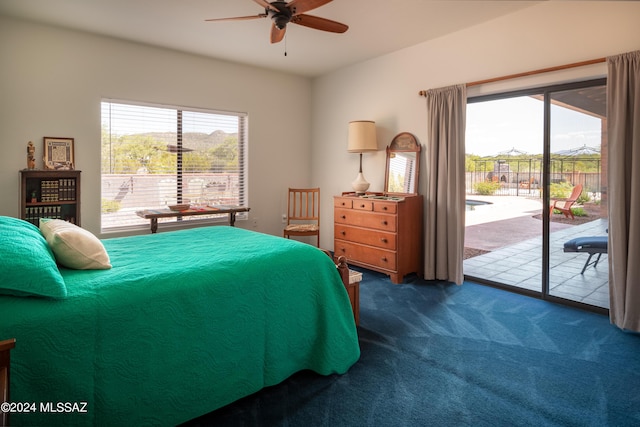 bedroom featuring dark colored carpet, a ceiling fan, and access to outside