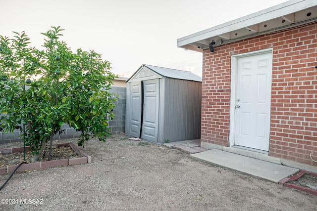 exterior space featuring a storage shed