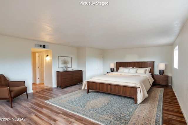 bedroom featuring wood-type flooring