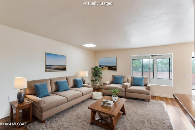 living room with light hardwood / wood-style floors