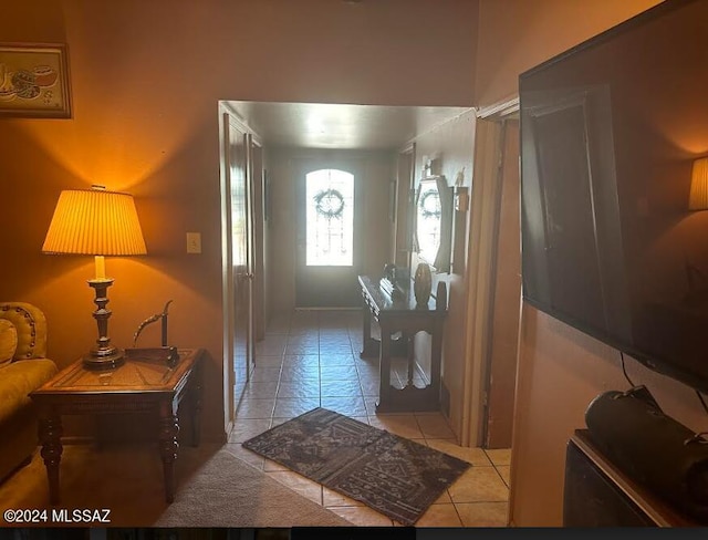 foyer featuring light tile patterned floors