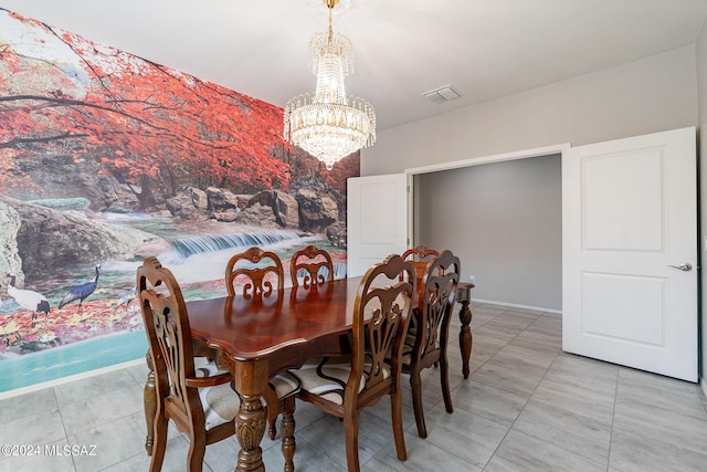 dining area with a chandelier