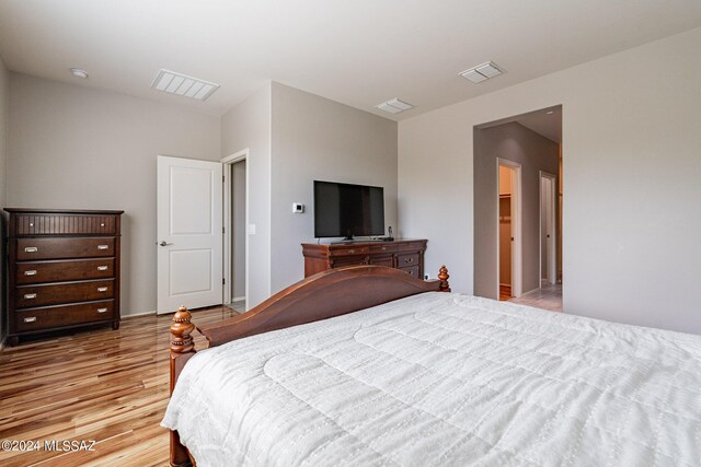 bedroom with light hardwood / wood-style floors