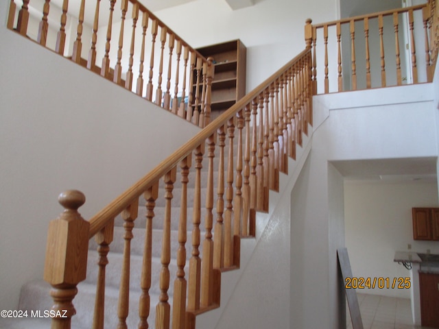 stairs with a towering ceiling