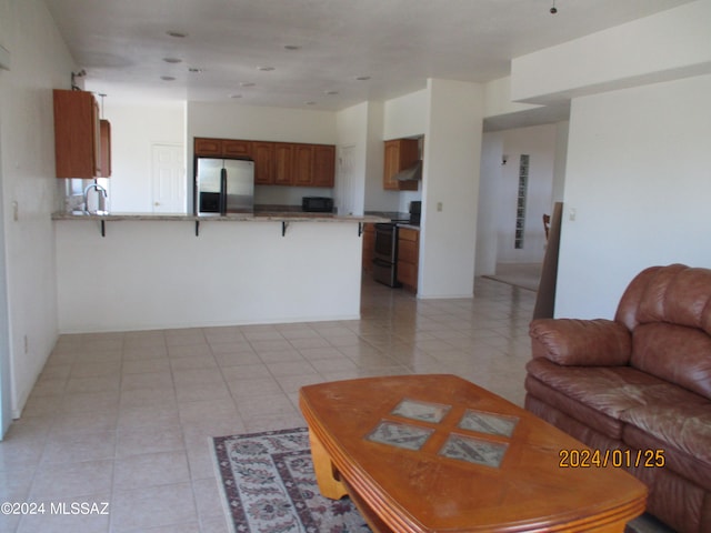 living room featuring light tile patterned floors