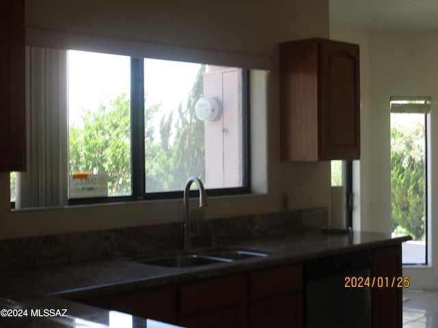 kitchen featuring sink and a healthy amount of sunlight