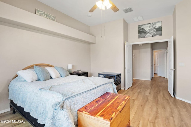 bedroom featuring ceiling fan and light hardwood / wood-style floors