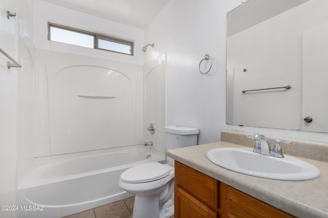 full bathroom with tile patterned floors, toilet, vanity, and tub / shower combination