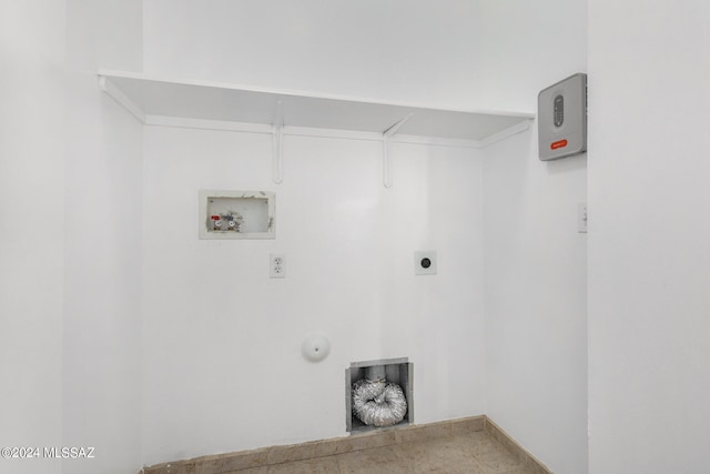 washroom with gas dryer hookup, hookup for a washing machine, and electric dryer hookup