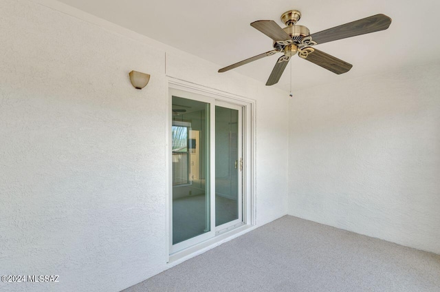 view of patio featuring a ceiling fan