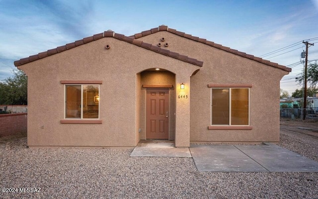 view of front of property with a patio